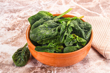 Fresh green spinach leaves heap