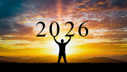 Symbolizing hope and ambition for the year 2026, a silhouetted figure raises the number against a vibrant sunrise, embodying future aspirations and new beginnings