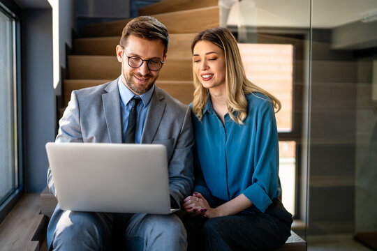 Multicultural business professionals in office, teamwork to achieve corporate success together - Powered by Adobe