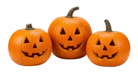 Three jack o lanterns with carved spooky faces glowing on a black background for halloween celebration