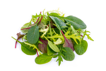 Heap of fresh mixed salad leaves including baby spinach arugula and chard isolated on white background, healthy green vegetable.