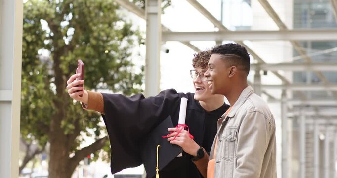 Smartphone camera activating graduate holding cap and diploma and friend waving on campus walkway