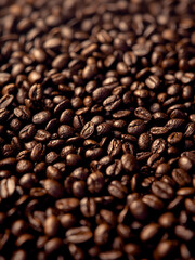Close-Up of Roasted Coffee Beans with Shallow Depth of Field and Warm Morning Sunlight Reflection.
