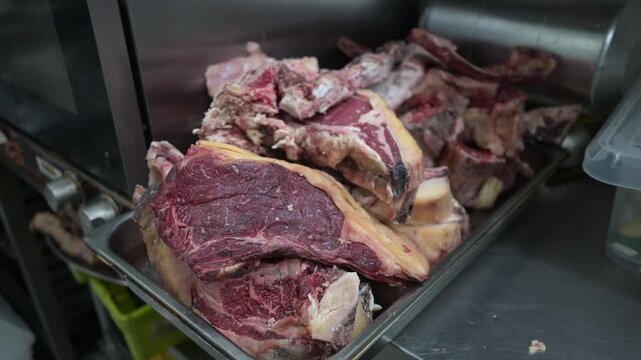 Close up of raw aged t-bone steaks ready for cooking