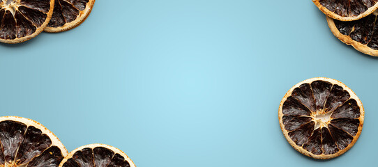 Dried grapefruit border on turquoise wellness banner