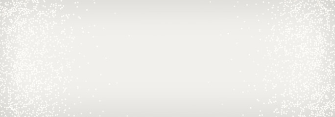 Light gray abstract background with small iridescent stars and space for text