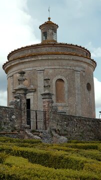 Clouds passing over the tempietto of the holy stairs of bomarzo. Action