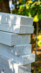 Stacked painted wooden beams outdoors