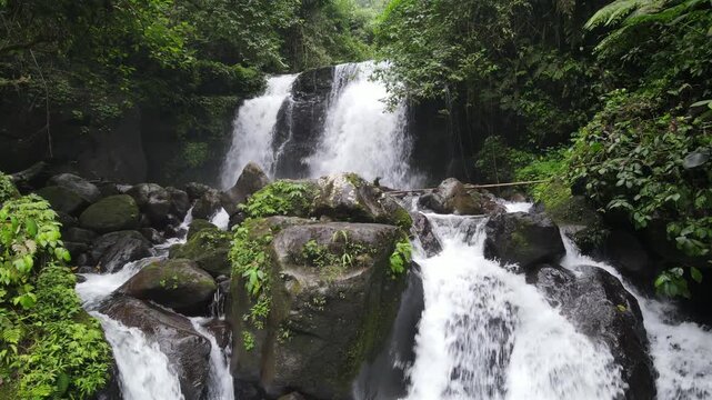 Aerial Drone Footage of Beautiful Waterfall in the Jungle &ndash; Batur Waterfall, Java Island, Indonesia
