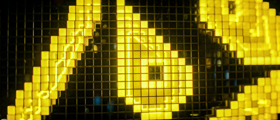 Bright yellow glowing geometric grid with pixelated blocks and illuminated abstract shapes, creating a vibrant, futuristic, and digital composition.