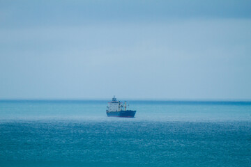 Aerial View of Large Container Cargo Ship Cruising in Open Sea