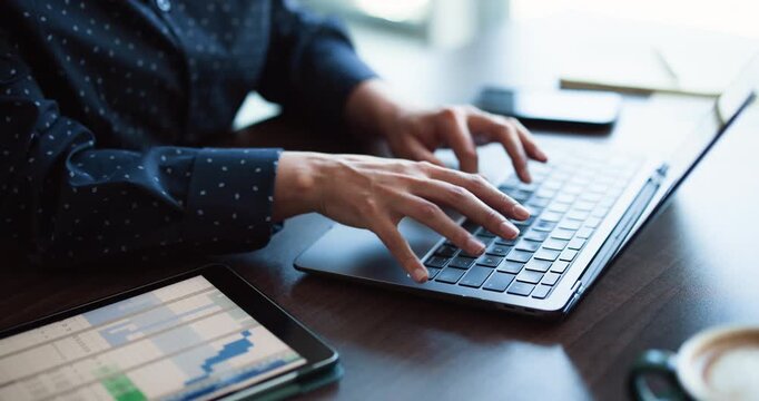 Chart, laptop and hands with business person in office for account bookkeeping, investment stats and research. Portfolio manager, planning and revenue projection on tablet with employee typing