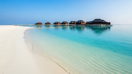 Tropical paradise with overwater bungalows and pristine white sand beach in the Maldives.