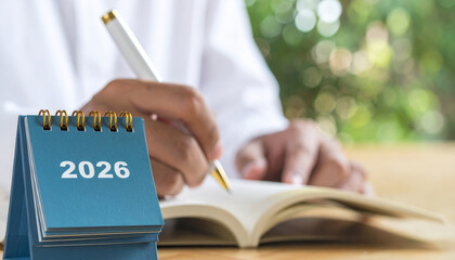 2026 planning future calendar strategy planer goal success management organization schedule vision person writing notes calmly