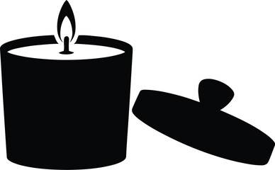 Simple black candle with flame and open lid on beige