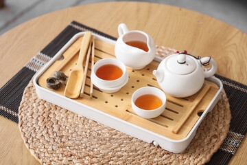Asian tea set on table in living room, closeup