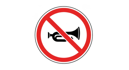 Silence Enforced: The red and white circular road sign warns of a no-horn zone.