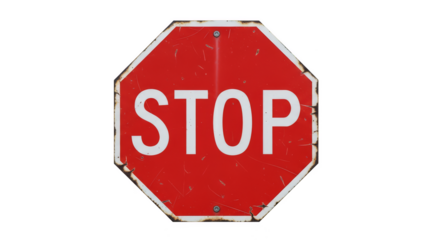 Red Octagon Stop Sign: A classic, weathered stop sign stands as a symbol of caution and regulation, its red octagon shape instantly recognizable.