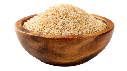 Whole toasted sesame seeds piled high in a natural wooden bowl, perfect for food preparation, baking, and healthy eating ingredient imagery.