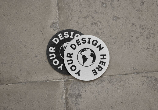 Mockup Of Two Customizable Round Coasters