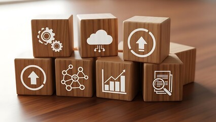 Wooden cubes with icons representing data analytics, cloud computing, networking, and business growth on a wooden surface