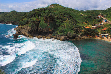 Tropical Coastal Cliff and Turquoise Waves in Indonesia