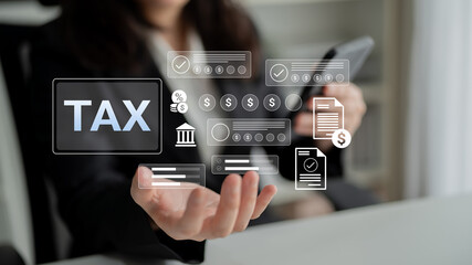 Professional person interacting with digital tax application and icons representing finance and...