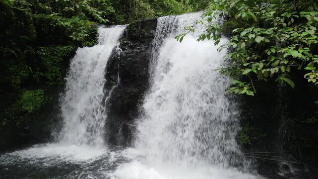 Aerial Drone Footage of Beautiful Waterfall in the Jungle &ndash; Batur Waterfall, Java Island, Indonesia
