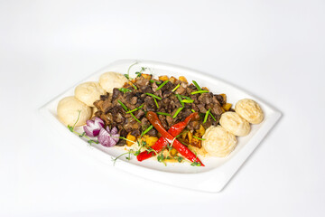 Hearty cooked meat with potatoes, herbs and chili - perfect for restaurant menus, comfort food branding or cultural cuisine visuals.