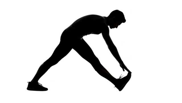 Man stretching hamstrings in silhouette against black background hamstring stretch - Powered by Adobe