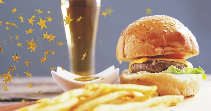 Camera framing shifting causing fries growing, burger moving into focus confetti floating for promo