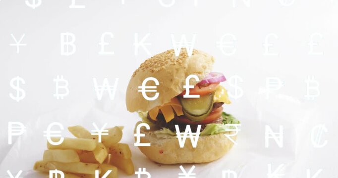 Camera panning down revealing sesame burger and fries while white money signs drifting showing cost