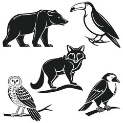 Obraz premium Set of black and white wild animals and birds, including a bear, a toucan, a wolf, an owl, and a raven, isolated on a transparent background