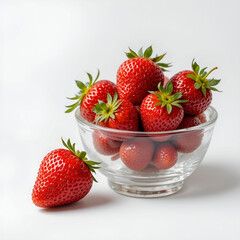 Fresh ripe strawberries arranged neatly in a minimal clear glass bowl.