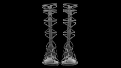 Obraz premium Pair of tall grey gladiator sandals with crisscross straps tall sandals knee high sandals