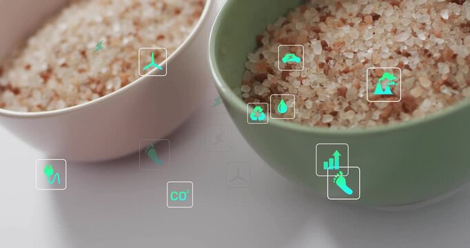 On start neon-green icons appearing and drifting over bowls, clustering to show eco metrics
