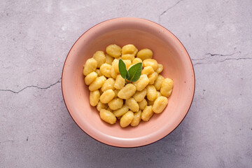 Italian gnocchi with butter and sage, top view