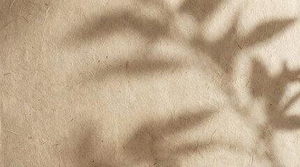 Textured beige paper with soft leaf shadows overlay brown natural