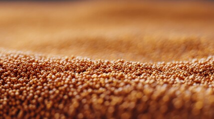Close-Up View of Fine Grains in Warm Brown Hue Featuring Textured Surface Perfect for Culinary and Natural Themes in Stock Photography