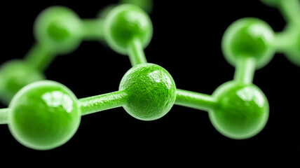 Green molecular structure against black background.
