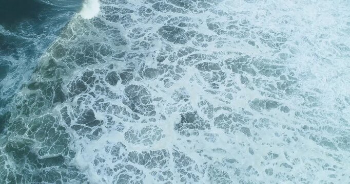 Aerial close up of ocean foam and waves. The Concept of Chaos