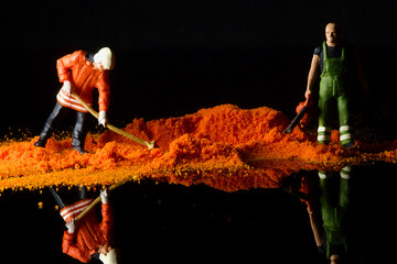 Tiny workers moving spice mountains miniature workers building a spice mountain project