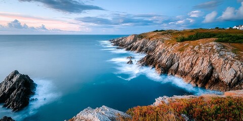 Breathtaking Sunset Over Dramatic Coastline with Rugged Cliffs and Eroded Headlands by the Ocean