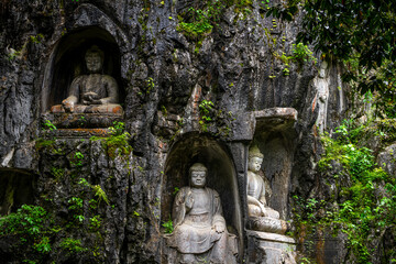 HangZhou, China, the stone statue the eighteen Arhats made in Northern Song DynastyPeak Flown From Afar Fei Lai Fen, Ling Jiu Feng , stands next to Lingyin Temple