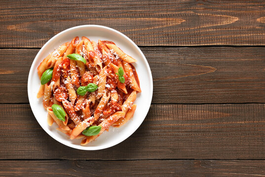 Italian penne pasta with tomato bolognese sauce