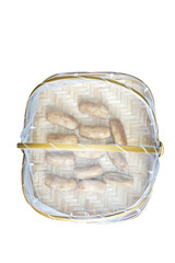 Top view of Dried bananas in Bamboo basket to prevent cattle fly, focus selective