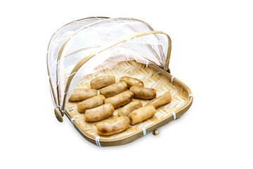 Top view of Dried bananas in Bamboo basket to prevent cattle fly, focus selectiveTop view of Dried bananas in Bamboo basket to prevent cattle fly, focus selective