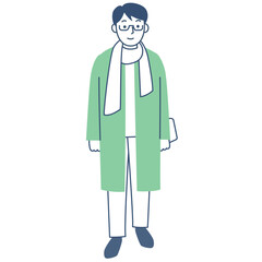 コートを着て歩く若い男性