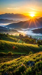Sunrise over rolling green hills and misty mountains