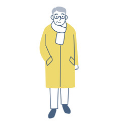 コートを着て歩くシニア男性